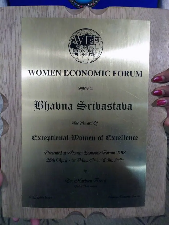 Women Economic Forum award plaque engraved with the name Bhavna Srivastava