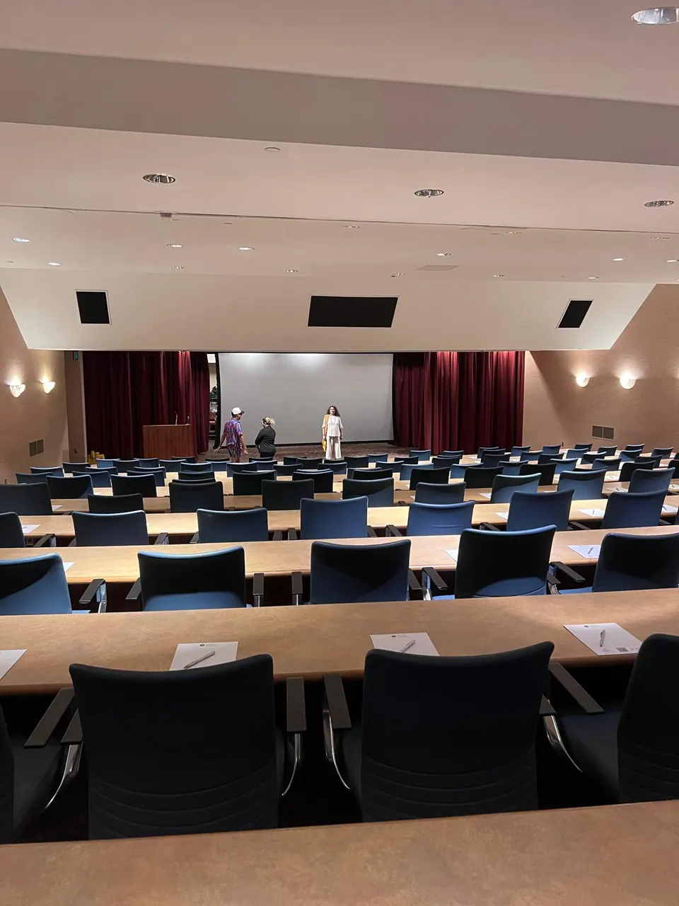 A conference room at the Hyatt Regency Orlando set with rows of chairs and tables