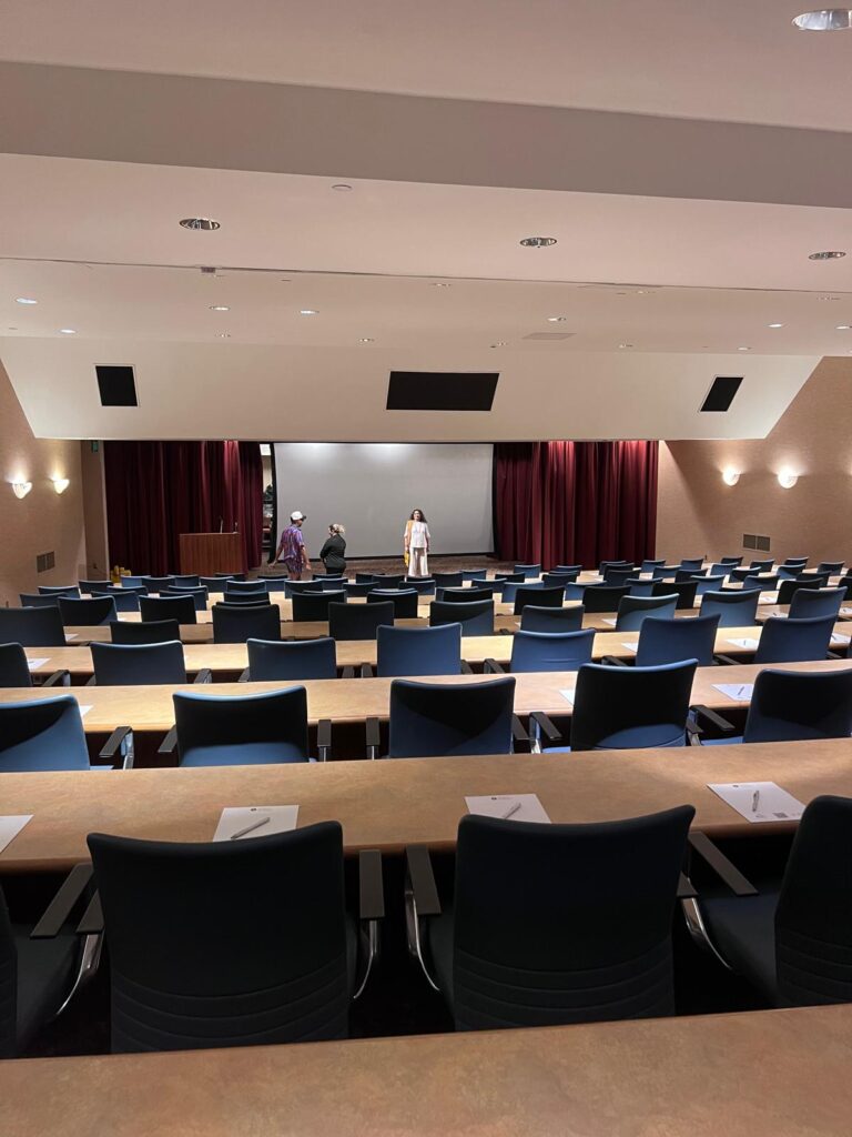 A conference room at the Hyatt Regency Orlando set with rows of chairs and tables