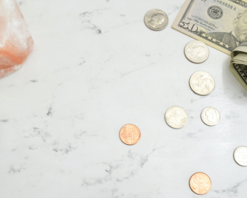 Pile of assorted coins on a table